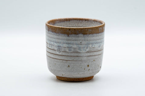Japanese Teacup - White Drip-Glazed Hagi-yaki Yunomi - 175ml - front view of the white drip-glazed cup with a brown-glazed lip