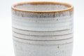Japanese Teacup - White Drip-Glazed Hagi-yaki Yunomi - 175ml - closeup of the glazed body and brown lip