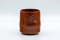 Japanese Teacups - Set of 5 Bamboo Tokoname-yaki Yunomi with Gift Box - 125ml - closeup front view of a single teacup showing the engraved bamboo leaf motif
