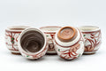 Japanese Teacup - Floral Brush Glazed Yunomi - group of the floral cups with some tilted to show the interiors