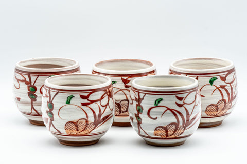 Japanese Teacup - Floral Brush Glazed Yunomi - front view of the white teacups decorated with red and green floral designs