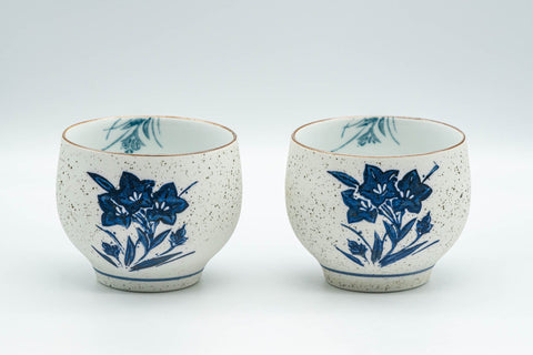 Japanese Teacups - Pair of White and Blue Floral Yunomi - 150ml - side view of both teacups
