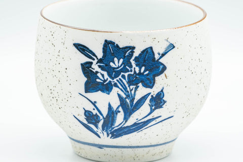 Japanese Teacups - Pair of White and Blue Floral Yunomi - 150ml - closeup of the blue-and-white floral painting on the exterior