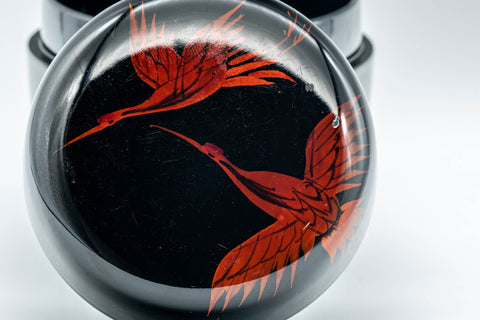 Japanese Natsume - Egrets Lacquer Matcha Tea Caddy - 100ml - overhead closeup of the soaring red egret motif
