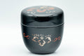 Japanese Natsume - Floral Lacquer Matcha Tea Caddy - 110ml - closed, three-quarter view of the floral lacquer caddy