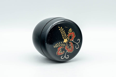 Japanese Natsume - Floral Lacquer Matcha Tea Caddy - 110ml - angled view showing the hand-painted red and gold floral design