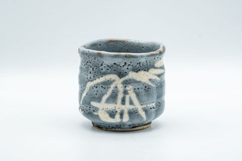Japanese Teacup - Bamboo Suana Shino Glazed Tsutsu-gata Yunomi with Coaster - front view showing the white bamboo motif on the textured glaze