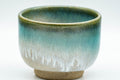 Japanese Teacup - Vibrant Agano-yaki Yunomi - 100ml - closeup of the turquoise drip glaze over the beige body