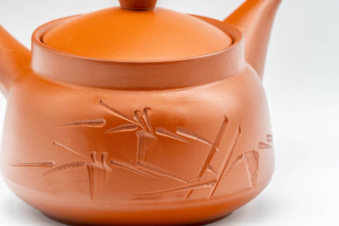 Japanese Tea Set - Bamboo Tokoname-yaki Debeso Kyusu Teapot with 5 Yunomi Teacups - closeup of the base showing the engraved bamboo design