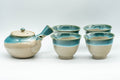 Japanese Tea Set - 上野焼 Agano-yaki Debeso Kyusu Teapot with 4 Yunomi Teacups - the Agano-yaki teapot shown with all four matching turquoise-glazed yunomi teacups