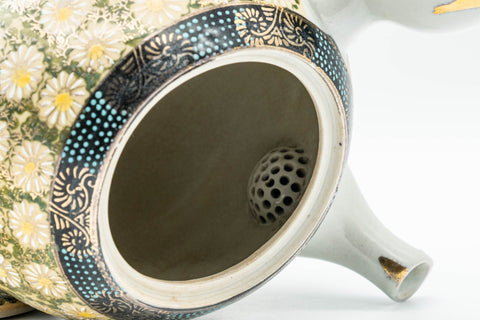 Japanese Tea Set - Kutani-yaki Debeso Kyusu Teapot with 1 Yunomi Teacup - closeup of the half-spherical ceramic debeso filter inside the teapot