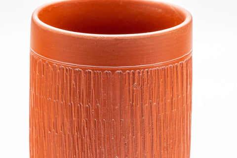 Tezumi — Japanese Teacup - Engraved Tsutsu-gata Tokoname-yaki Yunomi - 190ml — tipped to show the interior