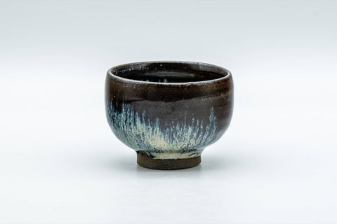 Japanese Teacup - Tenmoku Nagashi Glazed Guinomi - 50ml - front view of the rounded black tenmoku-glazed cup