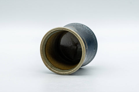Japanese Teacup - Matte Black Drip Glazed Guinomi - 45ml - angled view from above showing the interior with an orange drip around the rim