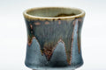 Japanese Teacup - Matte Black Drip Glazed Guinomi - 45ml - closeup of the drip glaze running down the matte black exterior