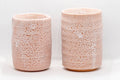 Japanese Teacups - Pair of Meoto Shino Glazed Tsutsu-gata Yunomi - 180ml - the pair shown together with the plum blossom decoration