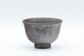Japanese Teacups - Set of 5 Banko-yaki Senchawan - 55ml - front view of a single cup showing the engraved plum blossoms