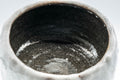 Japanese Matcha Bowl - Snowy Wabi-Sabi Hantsutsu-gata Chawan - 300ml - angled view showing the dark interior glaze