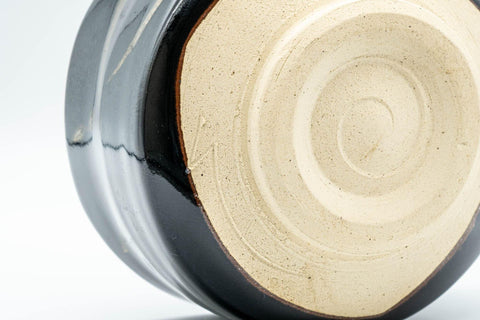 Tezumi — Japanese Matcha Bowl - Jet Black Hantsutsu-gata Chawan - 450ml — closeup of the glaze