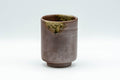 Japanese Teacup - Stoneware Shigaraki-yaki Yunomi - 190ml - front view of the rustic brown stoneware with a green ash glaze patch