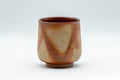 Japanese Teacup - Hidasuki Bizen-yaki Yunomi - 170ml - front view of the orange and brown Bizen-yaki teacup with scarlet hidasuki straw markings