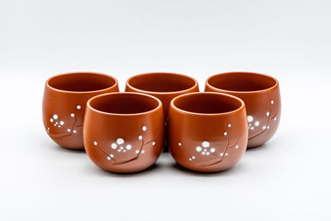 Japanese Teacup - Plum Blossoms Tokoname-yaki Yunomi - 125ml - the teacups arranged together showing the white plum blossom motif