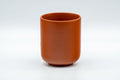Japanese Teacup - Bamboo Engraved Tokoname-yaki Yunomi - front view of a single plain red cup