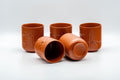 Japanese Teacup - Bamboo Engraved Tokoname-yaki Yunomi - group of cups with one tilted to show the interior