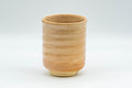 Japanese Teacup - Beige Tsutsu-gata Hagi-yaki Yunomi - 150ml - upright three-quarter view of the teacup