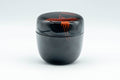 Japanese Natsume - Egrets Lacquer Matcha Tea Caddy - 100ml - front view of the closed black lacquer caddy