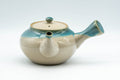 Japanese Tea Set - 上野焼 Agano-yaki Debeso Kyusu Teapot with 4 Yunomi Teacups - side view of the speckled turquoise teapot showing the side handle and spout
