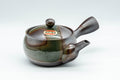 Tezumi — Japanese Kyusu - Green Ash Glazed Banko-yaki (萬古焼) Teapot - 275ml — three-quarter view