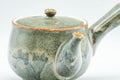 Tezumi — Japanese Tea Set - Green Drip-Glazed Debeso Kyusu Teapot with 5 Yunomi Teacups — closeup of the decoration