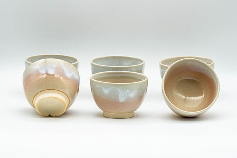 Japanese Tea Set - Tsubaki Kiln Hagi-yaki Kyusu Teapot with 6 Yunomi Teacups - the yunomi teacups grouped together, one inverted to show the foot