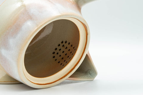 Japanese Tea Set - Tsubaki Kiln Hagi-yaki Kyusu Teapot with 6 Yunomi Teacups - closeup of the ceramic do-ake filter inside the teapot