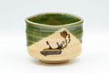 Japanese Matcha Set - Oribe-yaki Chawan with Bamboo Chasen Whisk and Chashaku Scoop - 450ml - front view of the Oribe chawan showing the green glaze and floral motif