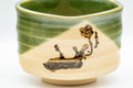 Japanese Matcha Set - Oribe-yaki Chawan with Bamboo Chasen Whisk and Chashaku Scoop - 450ml - side view showing the copper-green glaze