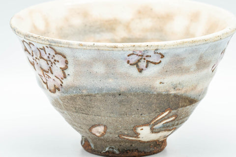 Japanese Matcha Bowl - Happy Rabbits Sakura Gohonte Chawan - 200ml - side closeup of the rabbit and blossom motif