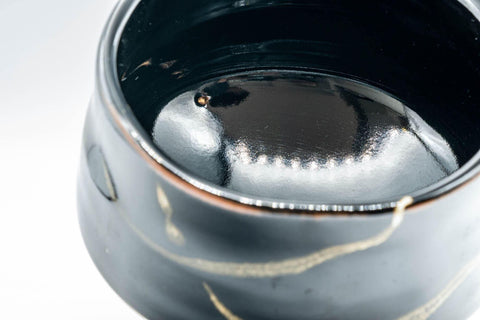 Tezumi — Japanese Matcha Bowl - Jet Black Hantsutsu-gata Chawan - 450ml — tipped to show the interior