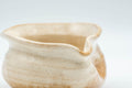 Tezumi — Japanese Katakuchi - Hagi-yaki Yuzamashi Water Cooler - 150ml — closeup of the glaze