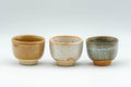 Tezumi — Japanese Teacups - Set of 3 Orange, White, and Grey-Green Guinomi - 35ml — front view