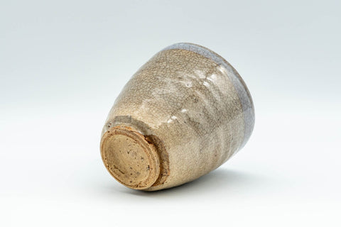 Japanese Teacup - Sadatsugu Shinjo, Sukeemon Kiln - Beige Glazed Hagi-yaki Yunomi - 150ml - the cup resting on its side