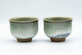 Tezumi — Japanese Teacups - Pair of Green Drip-Glazed Yunomi - 100ml — front view from another angle