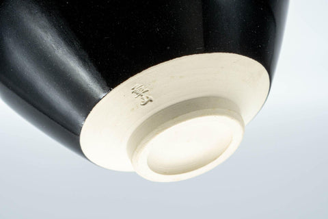 Tezumi — Japanese Matcha Bowl - 万代草山 Mandai Kusayama Black Tenmoku Metal Rim Chawan - 250ml — closeup of the glaze