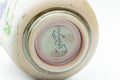 Japanese Teacups - Pair of Floral Green Meoto Yunomi - Arita-yaki - top-down view showing the foot and maker's stamp