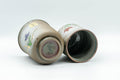 Japanese Teacups - Pair of Floral Green Meoto Yunomi - Arita-yaki - the cups tilted to show the undersides