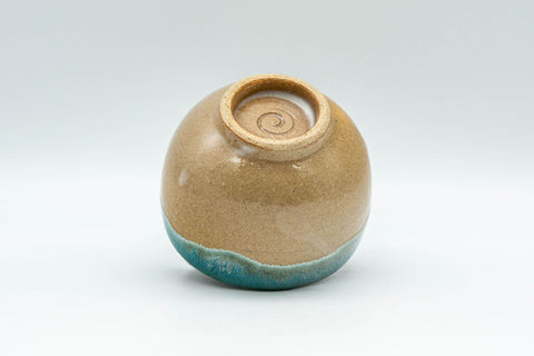 Japanese Teacup - 上野焼 Gold-flecked Agano-yaki Yunomi - 80ml - tilted to show the unglazed spiral foot