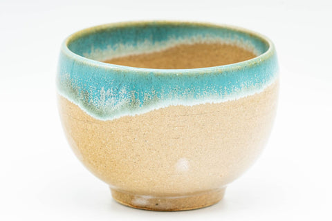 Japanese Teacup - 上野焼 Gold-flecked Agano-yaki Yunomi - 80ml - closeup of the turquoise enamel drip over the beige stoneware