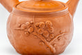 Japanese Kyusu - 不老 Itou Furo - Plum Blossoms Tokoname-yaki Do-ake Teapot - 250ml - three-quarter closeup of the organic hand-formed body