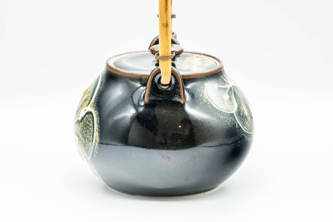Tezumi — Japanese Dobin - Black Floral Debeso Top-Handle Teapot - 600ml — side view showing the spout